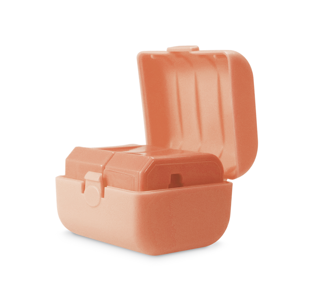 Three pieces of the universal travel adapter. This travel plug adapter is Coral. The World Traveler Travel Adapter is the perfect compact travel adapter to charge your tech on-the-go.